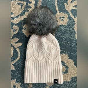 The North Face Cream Beanie with Gray Pom